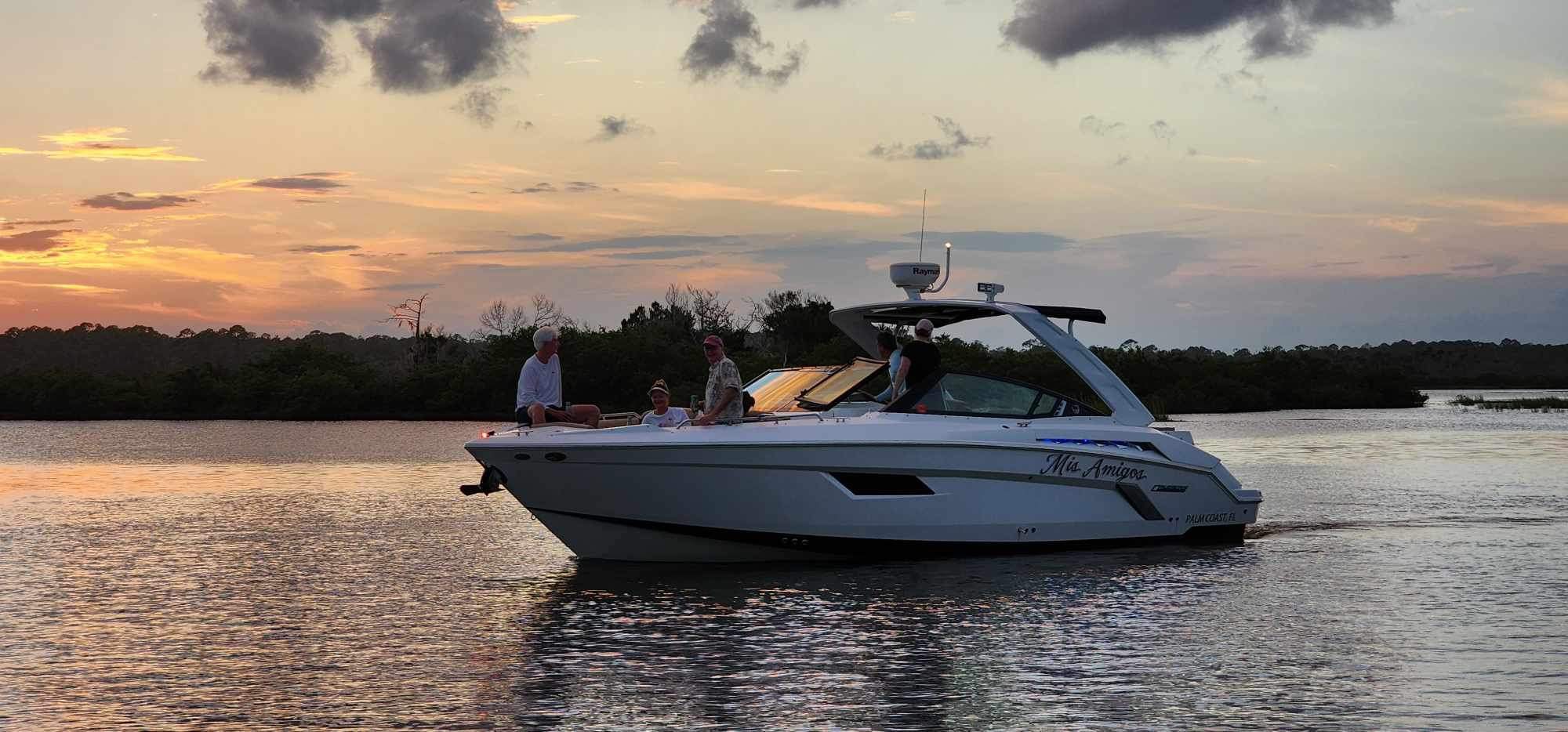 Mis Amigos yacht cruising the Fort Lauderdale Intracoastal at sunset